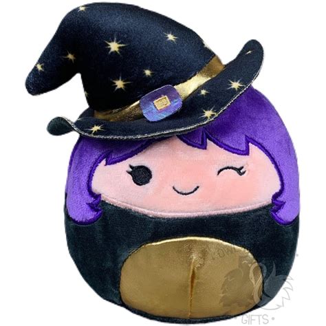 Squishmallow frog toy dressed as a witch
